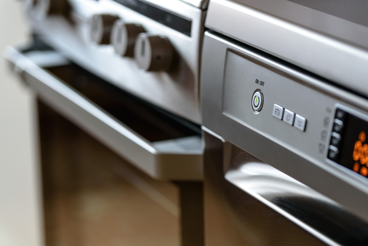 Close up of stove and dishwasher appliances